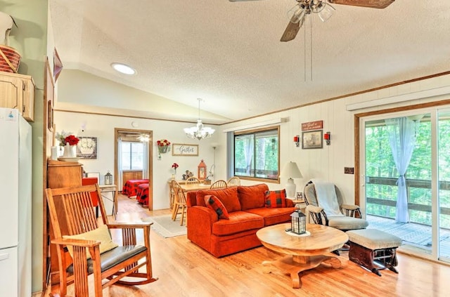 34 Clover Ln, Murphy, NC 28906 - living area with a textured ceiling, vaulted ceiling, light wood-style flooring, a chandelier, and ceiling fan