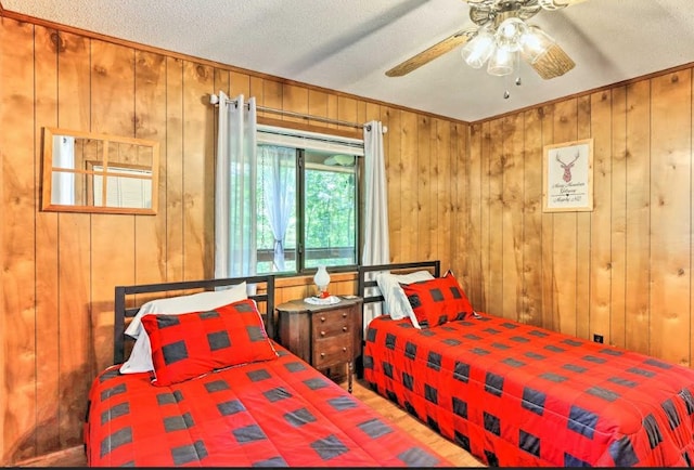 34 Clover Ln, Murphy, NC 28906 - bedroom featuring wooden walls and ceiling fan