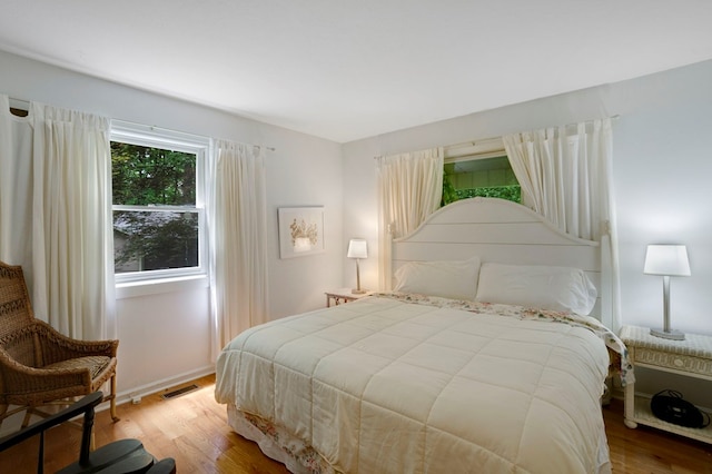 249 Chatuge Woods Dr, Hayesville, NC 28904 - bedroom featuring wood finished floors and baseboards