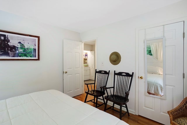 249 Chatuge Woods Dr, Hayesville, NC 28904 - bedroom with wood finished floors and washer / clothes dryer