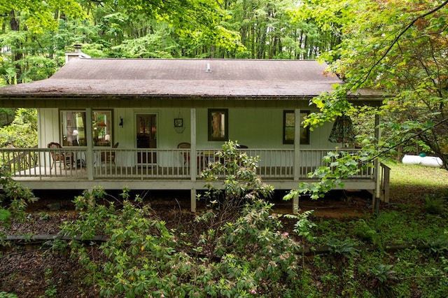 249 Chatuge Woods Dr, Hayesville, NC 28904 - view of front of home with a chimney and a wooden deck