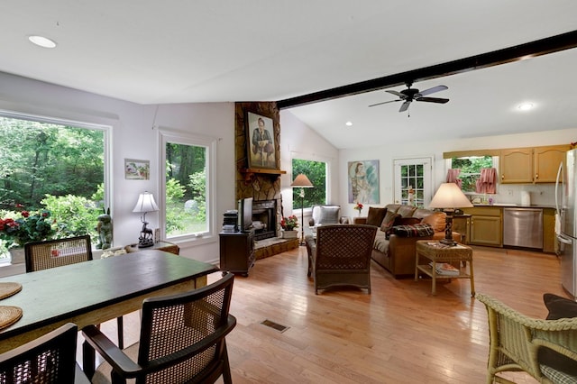 249 Chatuge Woods Dr, Hayesville, NC 28904 - living room with plenty of natural light, a fireplace, a ceiling fan, light wood-style floors, and recessed lighting