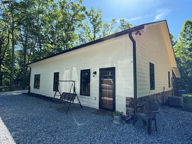 view of front of home with central air condition unit