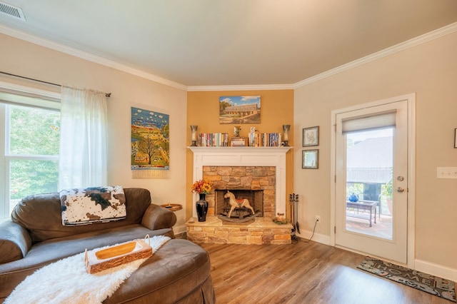 56 Highland Pointe Dr, Ellijay, GA 30536 - living area featuring ornamental molding, wood finished floors, and a stone fireplace