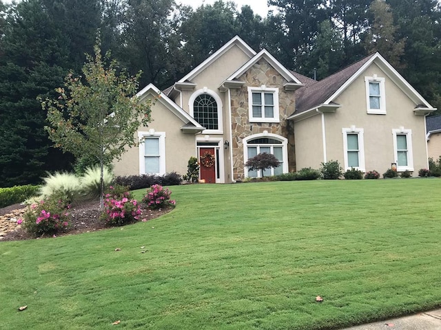 front facade with a front lawn