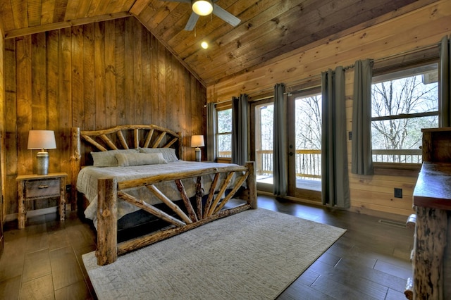 bedroom featuring high vaulted ceiling, wooden walls, dark wood finished floors, access to exterior, and wood ceiling