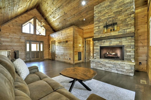 living area featuring high vaulted ceiling, wood finished floors, wood walls, and wooden ceiling