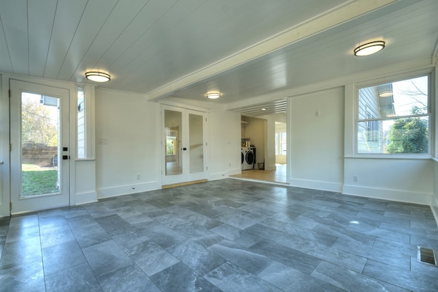 interior space featuring washing machine and dryer and french doors