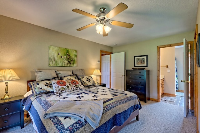bedroom with baseboards, a ceiling fan, and light carpet