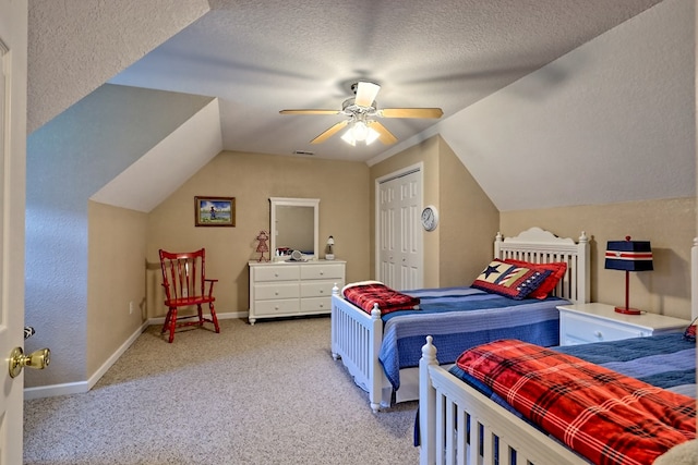bedroom with visible vents, carpet flooring, a ceiling fan, and vaulted ceiling