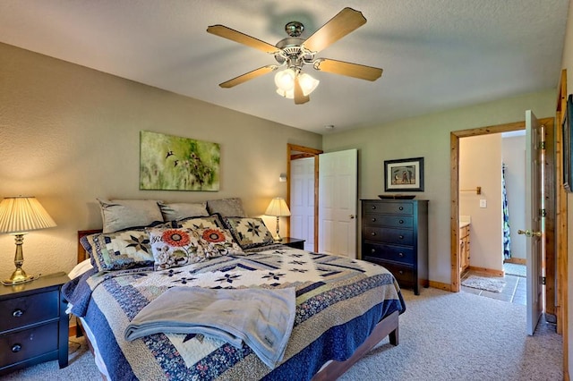 bedroom with baseboards, a ceiling fan, and light colored carpet