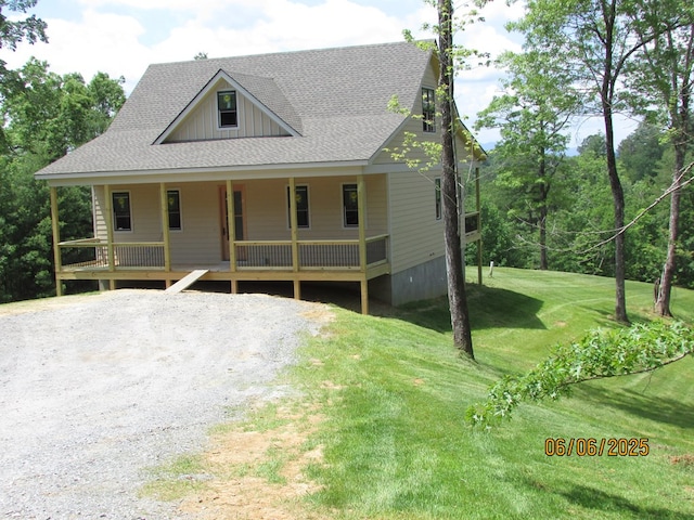 12 Shelton Springs S/D, Hayesville, NC 28904 - view of front of home with a shingled roof, a front lawn, board and batten siding, and a porch