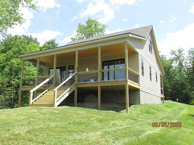 12 Shelton Springs S/D, Hayesville, NC 28904 - rear view of house with a lawn and stairs