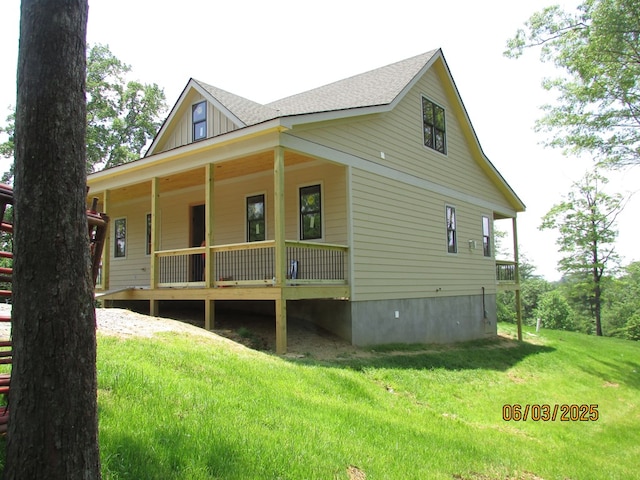 12 Shelton Springs S/D, Hayesville, NC 28904 - view of home's exterior with a lawn, covered porch, a shingled roof, and board and batten siding