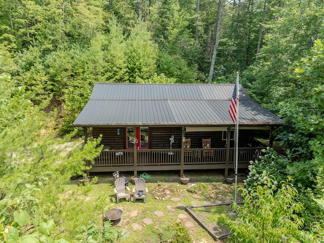 rear view of property with a deck