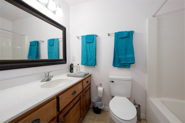 bathroom featuring tile patterned floors, vanity, and toilet