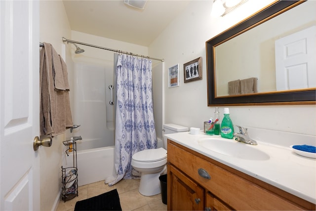 full bathroom with tile patterned flooring, vanity, toilet, and shower / bath combo with shower curtain