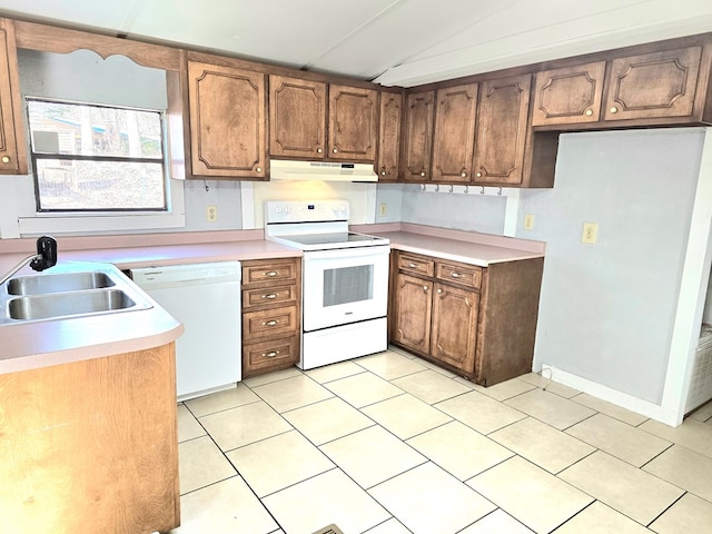 646 Snowy River Pl, Clarkesville, GA 30523 - kitchen with white appliances, under cabinet range hood, light countertops, light tile patterned floors, and lofted ceiling