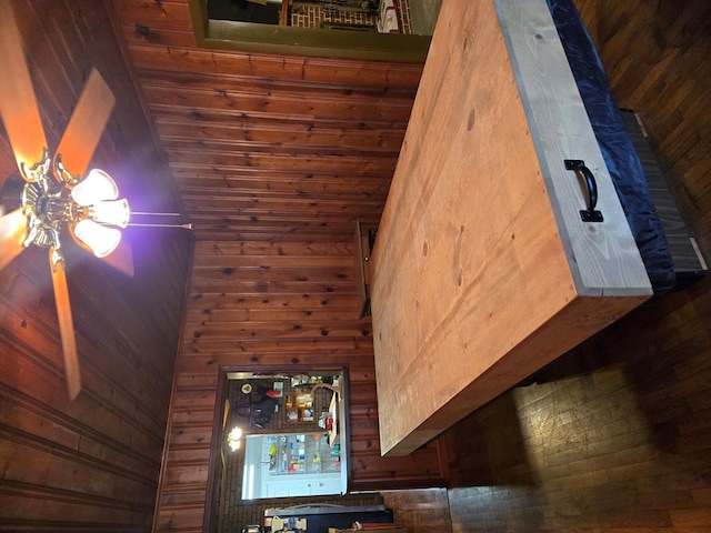 interior space featuring wood walls
