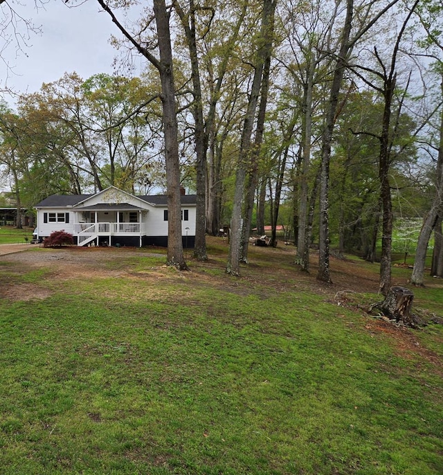 view of yard featuring a porch
