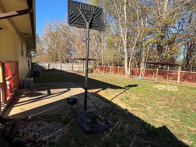 view of yard featuring a patio and central AC unit