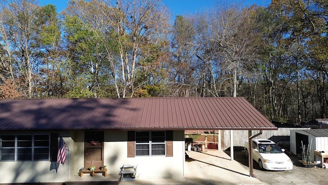 exterior space featuring a carport