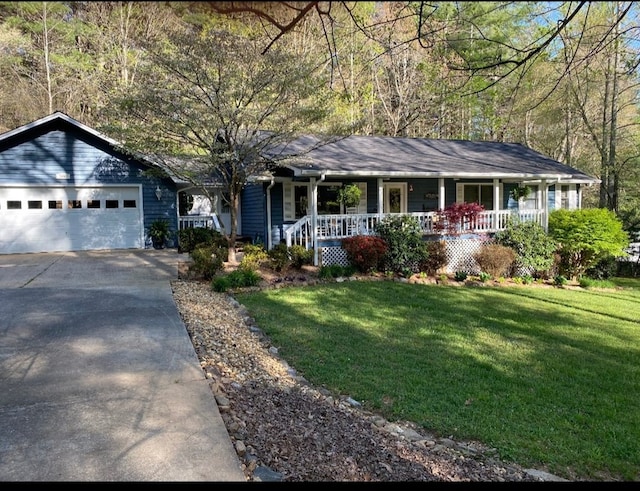 single story home with a garage, a front lawn, and a porch