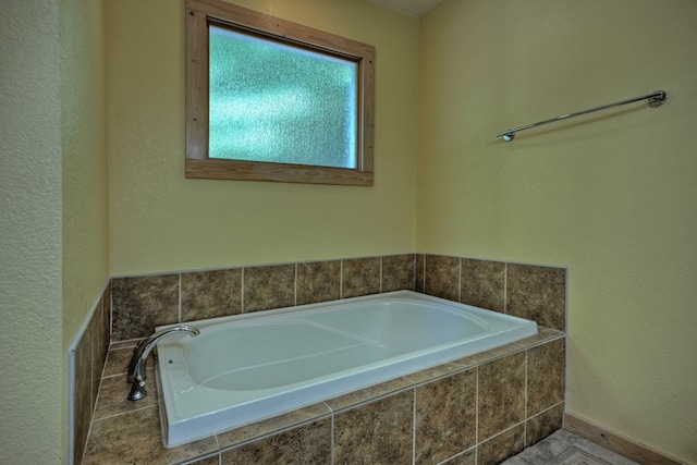 bathroom featuring a garden tub