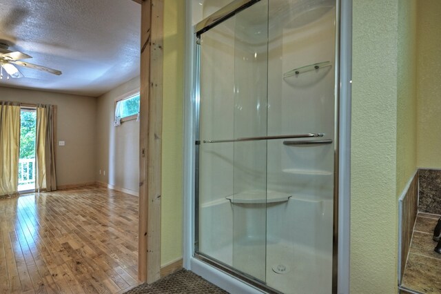 bathroom featuring independent shower and bath