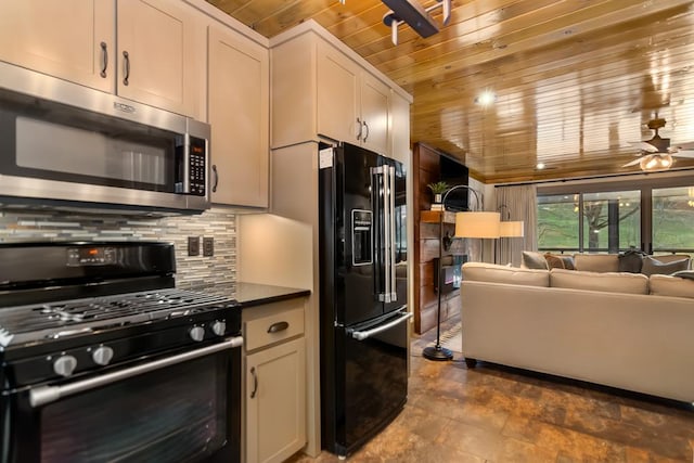 kitchen with wood ceiling, gas range, stainless steel microwave, tasteful backsplash, and black refrigerator with ice dispenser