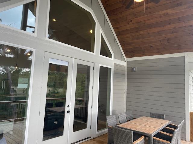 exterior space with french doors and ceiling fan