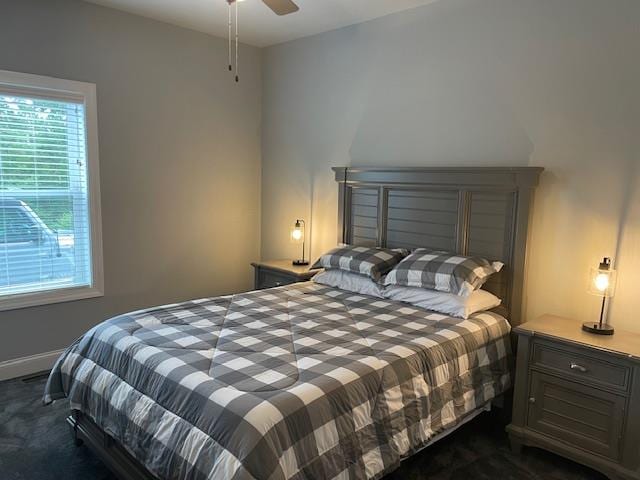 carpeted bedroom with ceiling fan