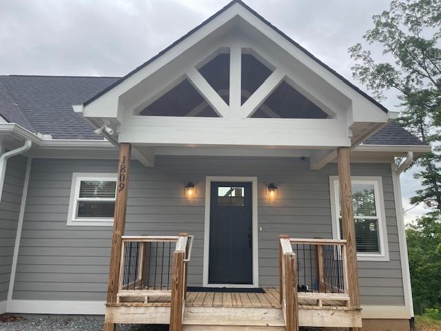 entrance to property with covered porch