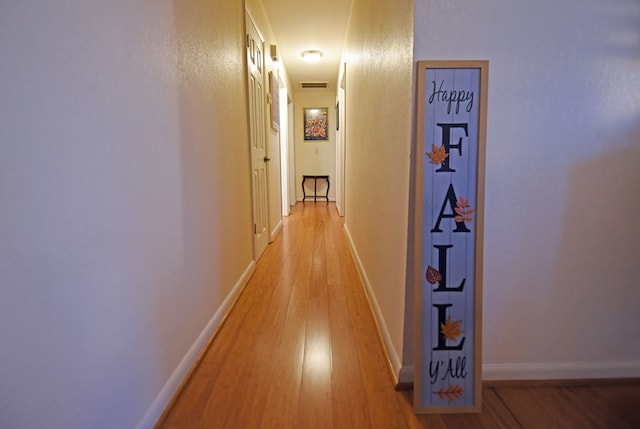 hallway featuring light wood-type flooring