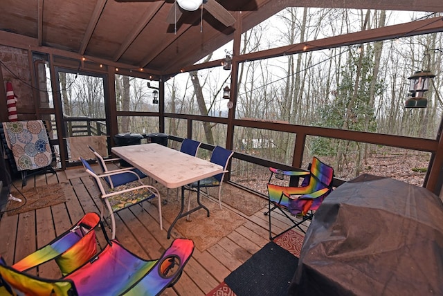 deck featuring ceiling fan and area for grilling