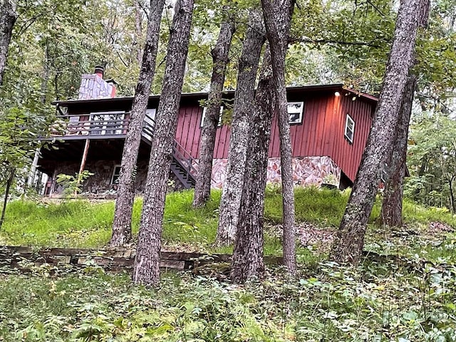 view of front of home with a wooden deck