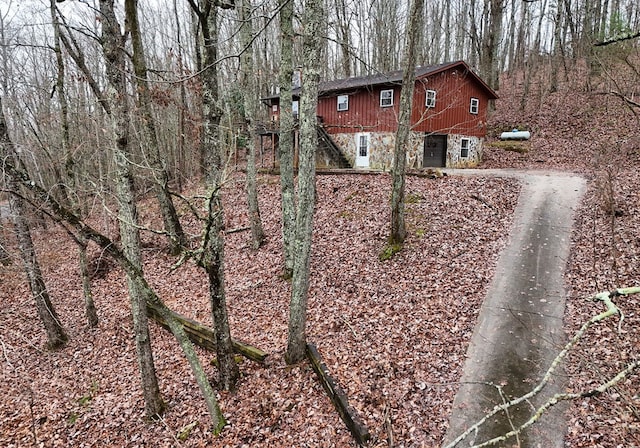 view of side of property featuring a garage