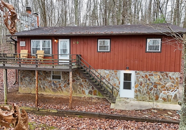 rear view of house with a deck