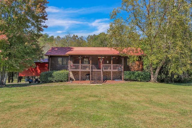 32 Mountain Meadows Dr, Hayesville, NC 28904 - back of house with stairs, a yard, and metal roof