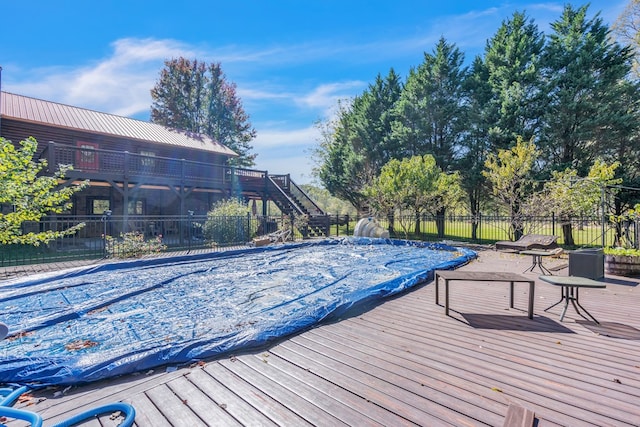 32 Mountain Meadows Dr, Hayesville, NC 28904 - view of swimming pool featuring fence, a wooden deck, stairway, and a water slide