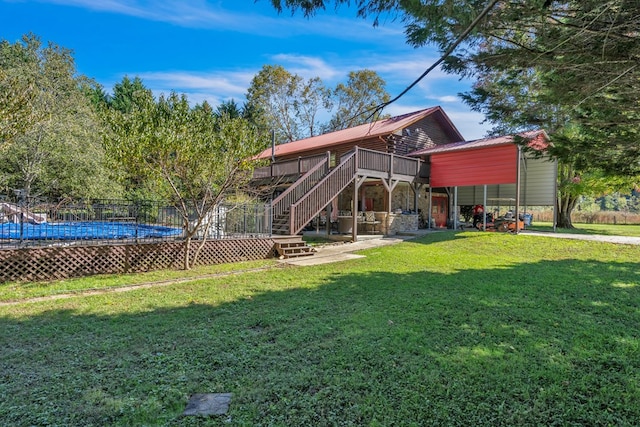 32 Mountain Meadows Dr, Hayesville, NC 28904 - back of house with a deck, stairway, a lawn, and metal roof