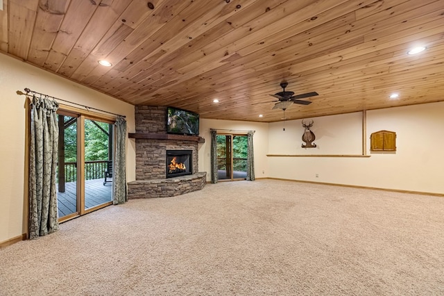 unfurnished living room with baseboards, wood ceiling, carpet floors, a fireplace, and recessed lighting