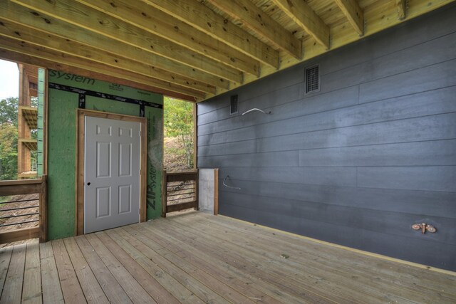 wooden terrace with a mountain view