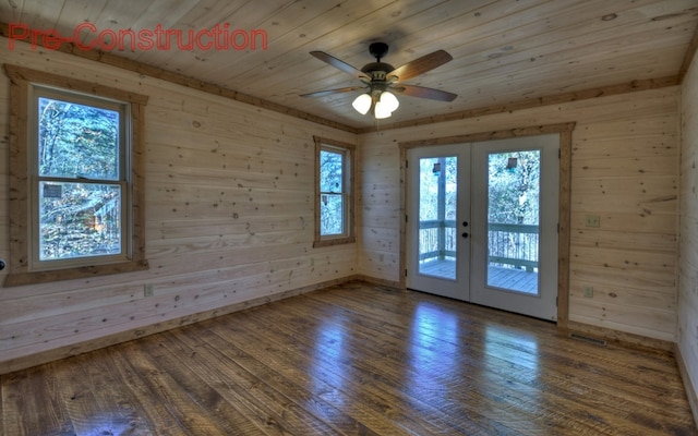 unfurnished room featuring french doors, wooden ceiling, and wood finished floors