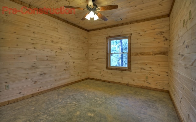 spare room with ceiling fan and wooden ceiling