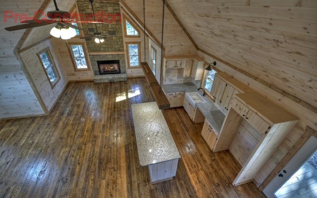 unfurnished living room featuring wood ceiling, a sink, high vaulted ceiling, and dark wood-style flooring