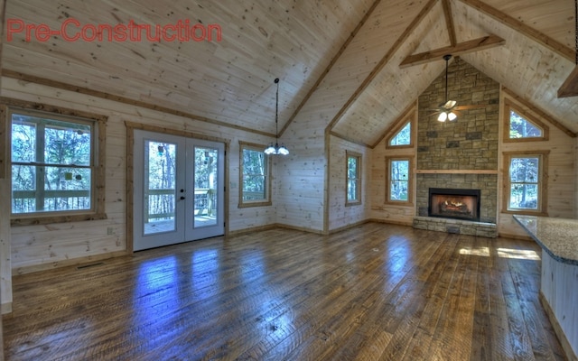 unfurnished living room with high vaulted ceiling, a fireplace, french doors, wood-type flooring, and wooden ceiling