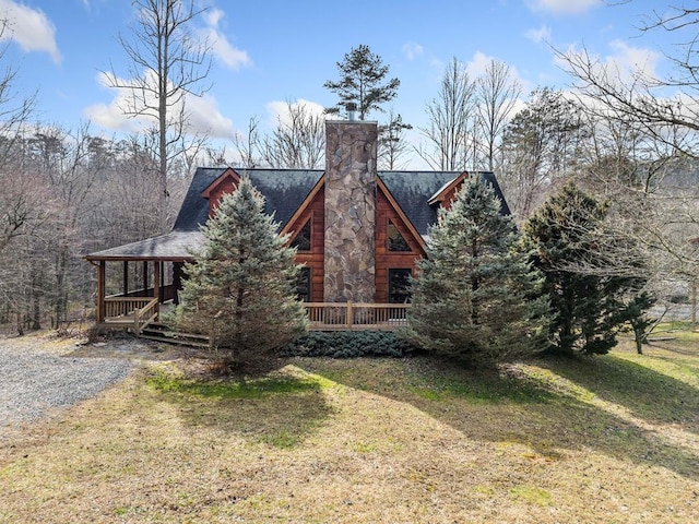 view of home's exterior with a lawn