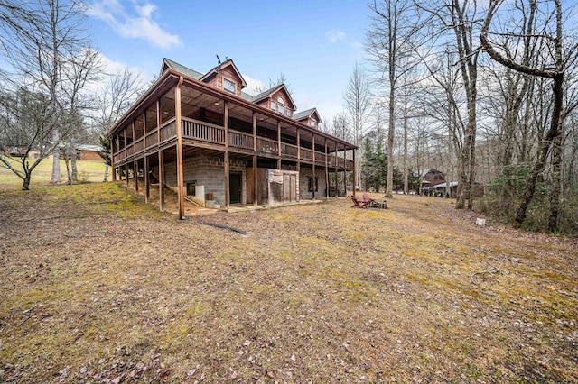 rear view of house with a deck