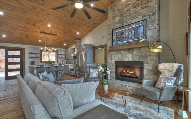 living room featuring a fireplace, vaulted ceiling, ceiling fan with notable chandelier, wood ceiling, and dark hardwood / wood-style flooring